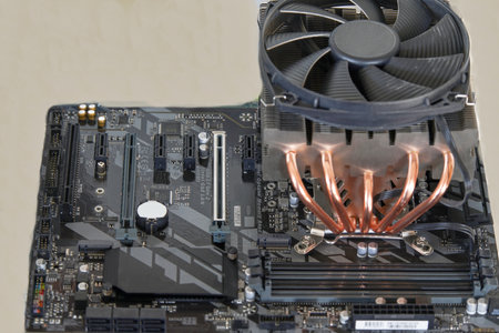 Closeup of a computer processor with a cooling fan on the motherboard