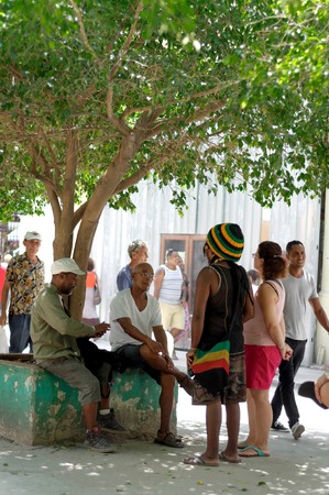 Cubans speak on the Obispo street.  Havana, CUBA - August 2, 2015のeditorial素材