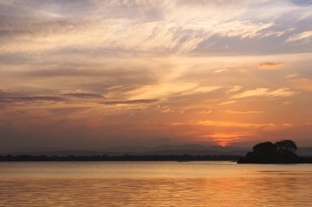 The Parakrama Samudra lake view at dusk in Polonnaruwa Sri Lanka. Parakrama Samudra or Sea of Parakrama is a huge reservoir built by the King Parakramabahu the Great.の写真素材