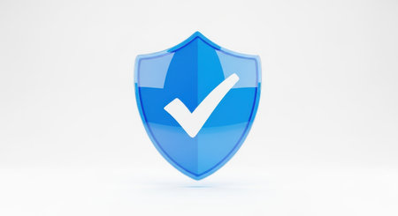 A vibrant blue shield icon with a white checkmark signifies security and approval. This symbol represents protection, trust, and verified status, ideal for digital security and quality assurance.の素材