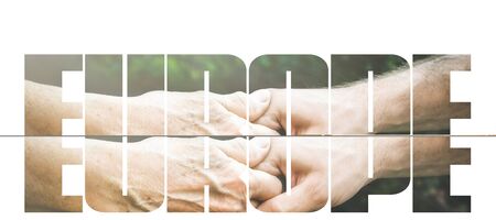 COVID-19 coronavirus. Fill text EUROPE, old, young hands, red heart image cut. Elderly people health. Compassion, dangerous, volunteer, help, virus outbreak, stop sign, stay at home.の写真素材