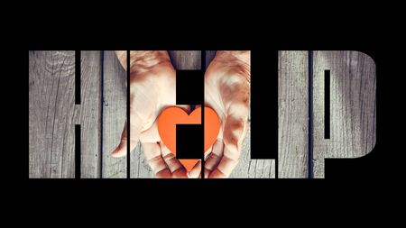 COVID-19 coronavirus. Fill text HELP with old, young hands, red heart image cut. Elderly people health. Compassion, dangerous, volunteer, help, virus outbreak, stop sign, stay at home.の写真素材