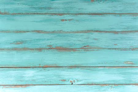 Wood rustic light blue or green background. Old wooden table, top view. Vintage natural texture, grunge weathered surface, copy space for your text.の写真素材