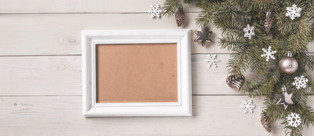 Christmas light blue background, frame for wishes, corner set. Fir branches, blue silver baubles,...