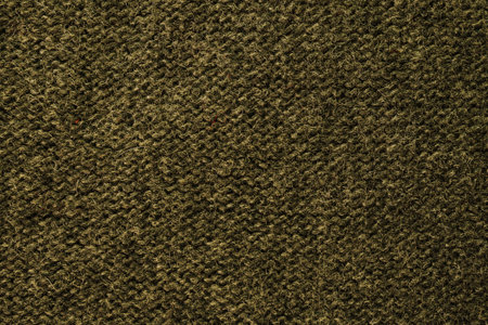 Knitted khaki pattern closeup. Soft sweater texture, detailed yarn background. Natural woolen fabric, a fragment of a jersey pullover. Trendy backdrop for print, web design.の写真素材