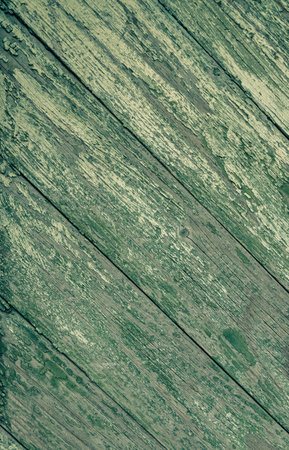 Old wood texture background. Vintage aged wooden surface. Natural rustic scratched shabby planks. Distressed grunge painted boards.の写真素材