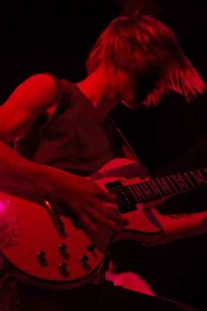 Guitar player, rocking out on stage