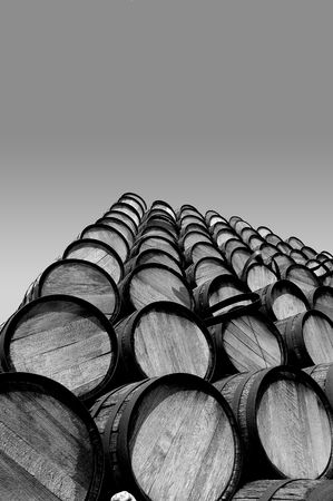 A stack of kegs into a gradient skyの写真素材