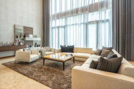 BANGKOK, THAILAND - JULY 6, 2017: Living room impressive modern designs with sofa and armchairs, and...