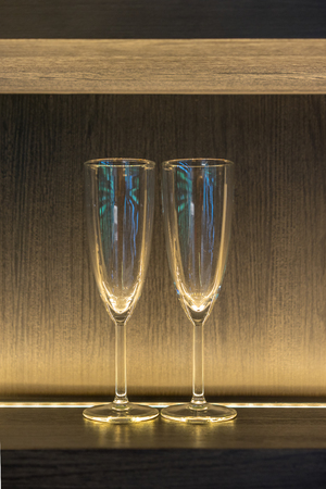 Transparent empty wine glasses on dark background.の写真素材