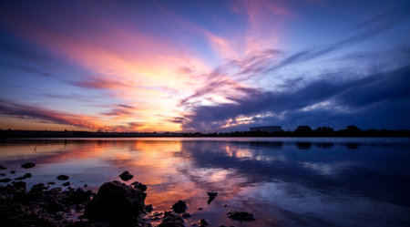 Beautiful sunset over the river in the summer. Landscape.