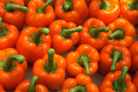 Brightly colored bell peppers at the market stall. Shallow depth. の写真素材