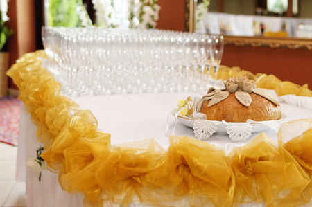 Bread and wine glasses for a wedding receptionの写真素材