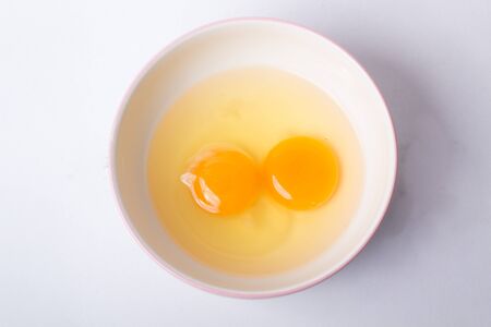 yolks on a plate on a white background