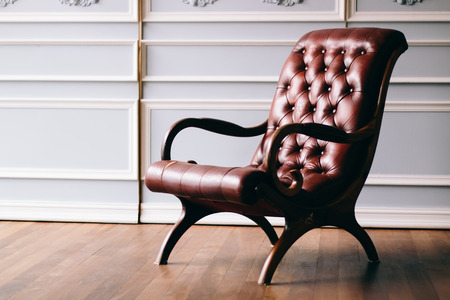 Old chair on vintage background and wooden floor - Vintage grunge empty interiorの写真素材