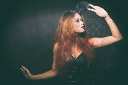 Scary woman halloween concept, crazy, lunatic, mentalの写真素材