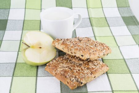 bun, milk and green apple breakfastの写真素材