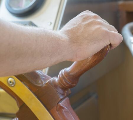 seaman steering ship wheelの写真素材