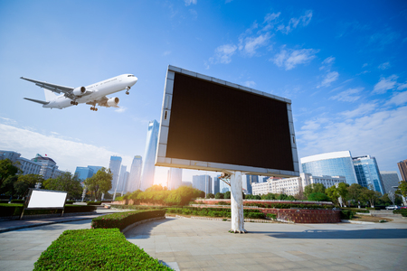 airplane near blank billboard in beautiful natureの写真素材