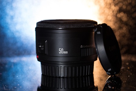 Camera lens on dark background の写真素材