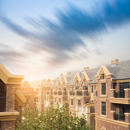 Panoramic view of old town in Europe in beautiful evening light at sunset with retro vintage style grunge filter and lens flare effectのeditorial素材