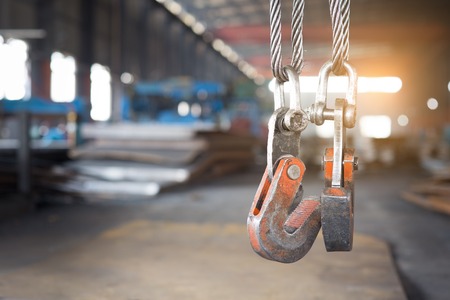 empty warehouse interior with crane hookの写真素材