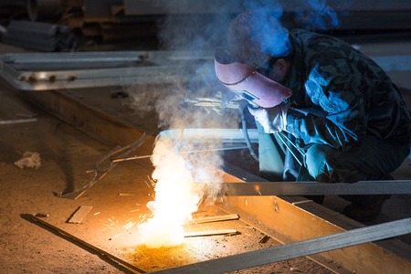 industrial worker welding sparkingの写真素材