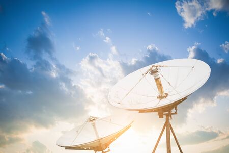 satellite dish antennas under skyの写真素材