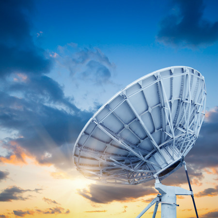 satellite dish antennas under skyの写真素材