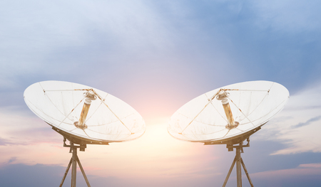satellite dish antennas under skyの写真素材
