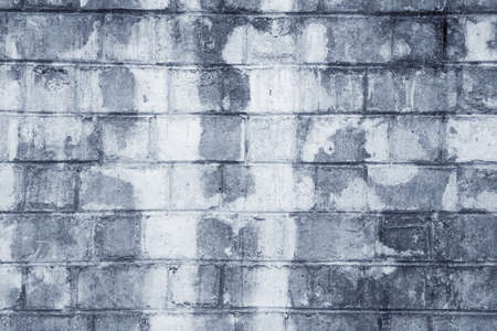 White grunge brick wall backgroundの写真素材