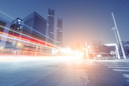 the light trails on the modern building background in shanghai china.の写真素材