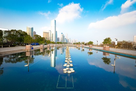 modern buildings and empty road in urban city at riverbankのeditorial素材
