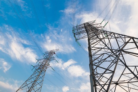 High-voltage tower sky background.の写真素材