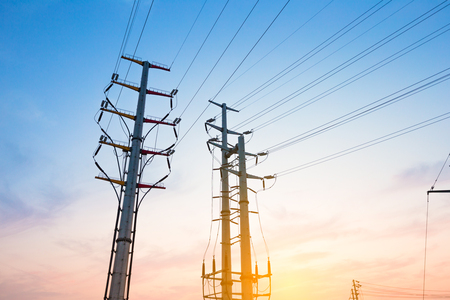 High-voltage tower sky background.の写真素材