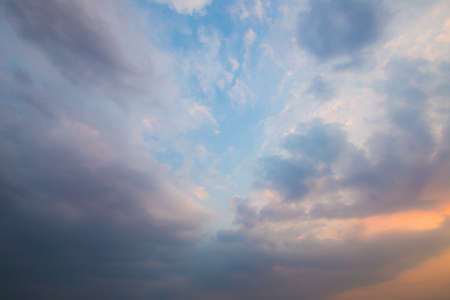 Blue sky with clouds and sun reflection in water with place for your textの写真素材