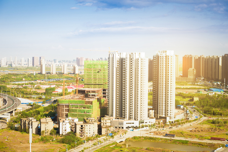 Aerial Cityscape at dusk, China Nanchang buildings and rivers.の写真素材