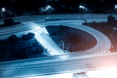 closeup of the light trails on grade separation bridgeの写真素材