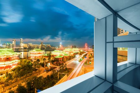 A bird's eye view of the city night view outside the windowのeditorial素材