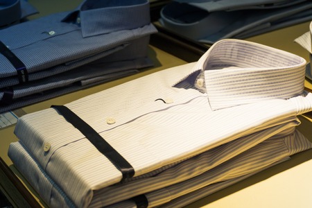 Pastel Color Clothes. Female Clothes on Open Clothes Railのeditorial素材