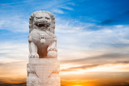 Traditional Chinese stone lions, Bund in Shanghai before the old building.のeditorial素材