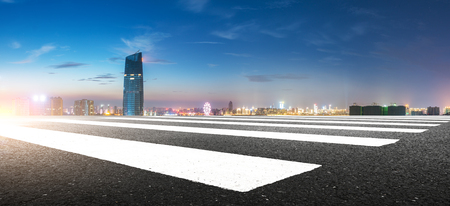 nigh scene of seoul from empty road near riverの写真素材