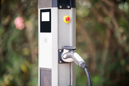 Power supply for electric car charging. Electric car charging station.Blurred Backgroundの写真素材