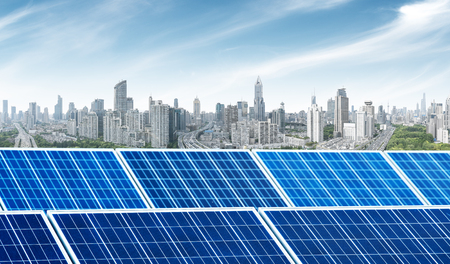 Urban background solar panels, Shanghai, China.の写真素材
