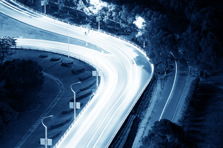 closeup of the light trails on grade separation bridgeの写真素材
