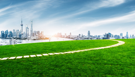 empty brick floor and cityscape of shanghai in blue sky