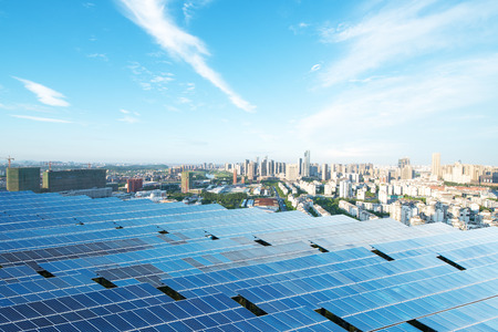 solar panel with cityscape of los angeles in cloud skyの写真素材