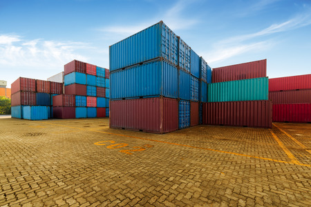 Industrial container yard of logistics import and export business under the blue skyの写真素材