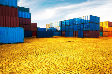 Industrial container yard of logistics import and export business under the blue skyの写真素材