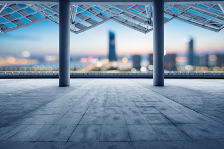 cityscape of modern city at dawn from empty floorの写真素材